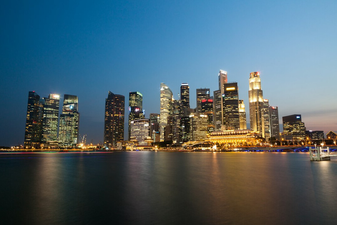 Singapore Marina Bay skyline with modern skyscrapers at dusk